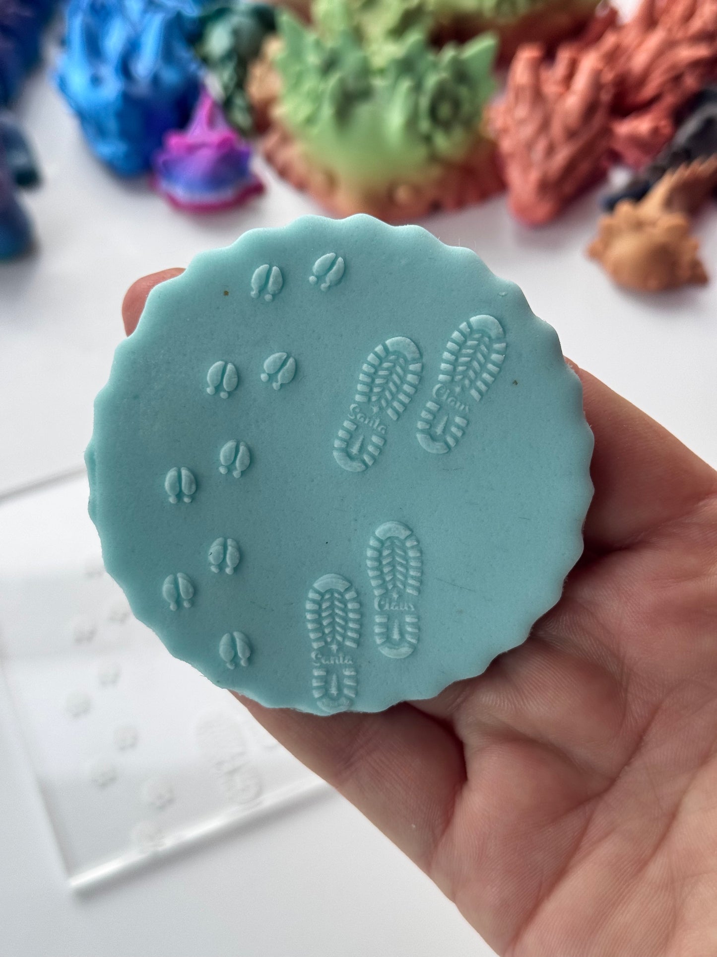 footprint Christmas Santa Claus and reindeer deboss