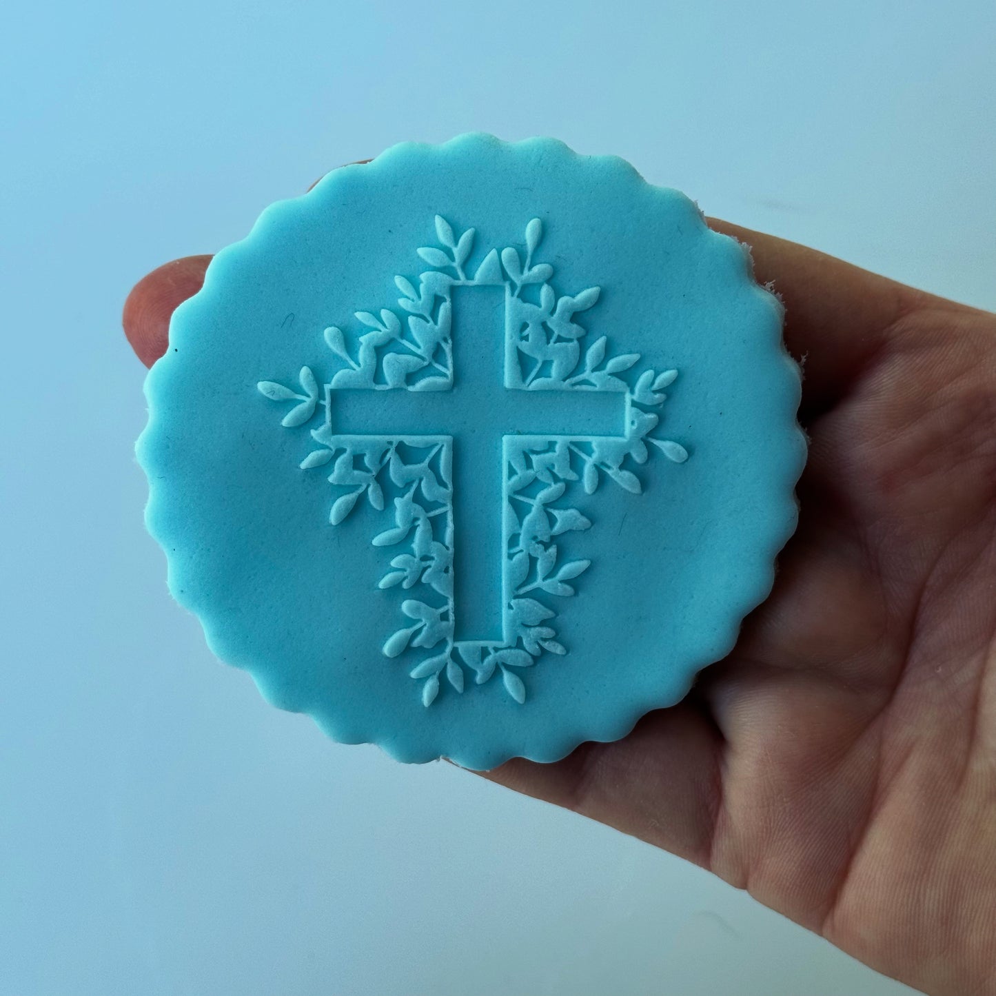 Cross deboss