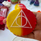 The deathly Hallows disc deboss - Harry Potter-inspired