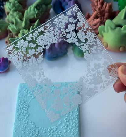 Pattern, texture and roller collection: floral embossing mat pressed onto pale blue fondant