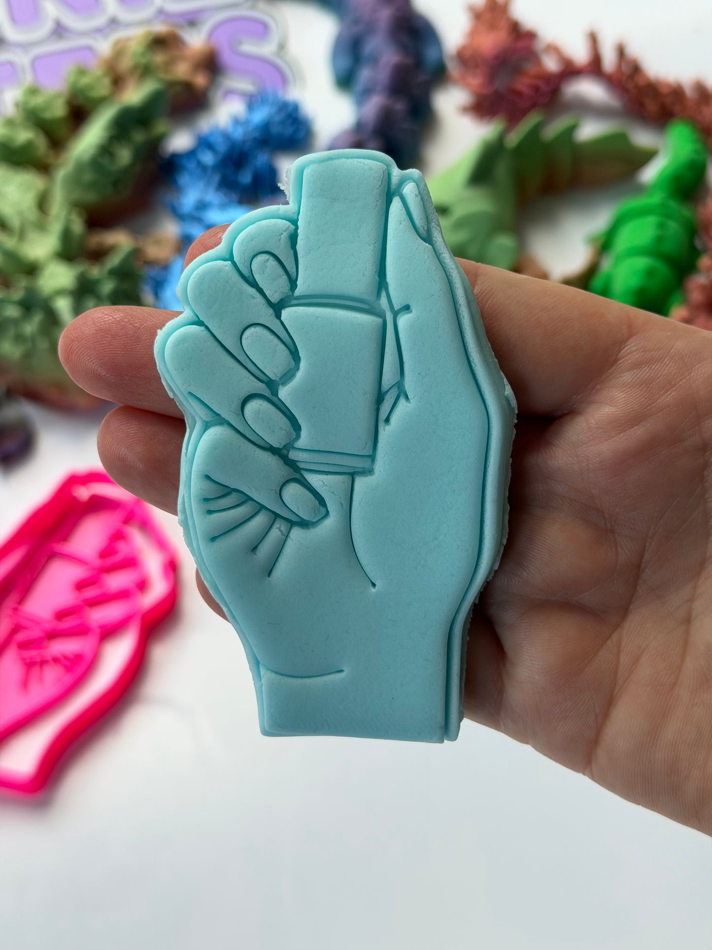 Saloon- hand holding Nail polish cutter + stamp