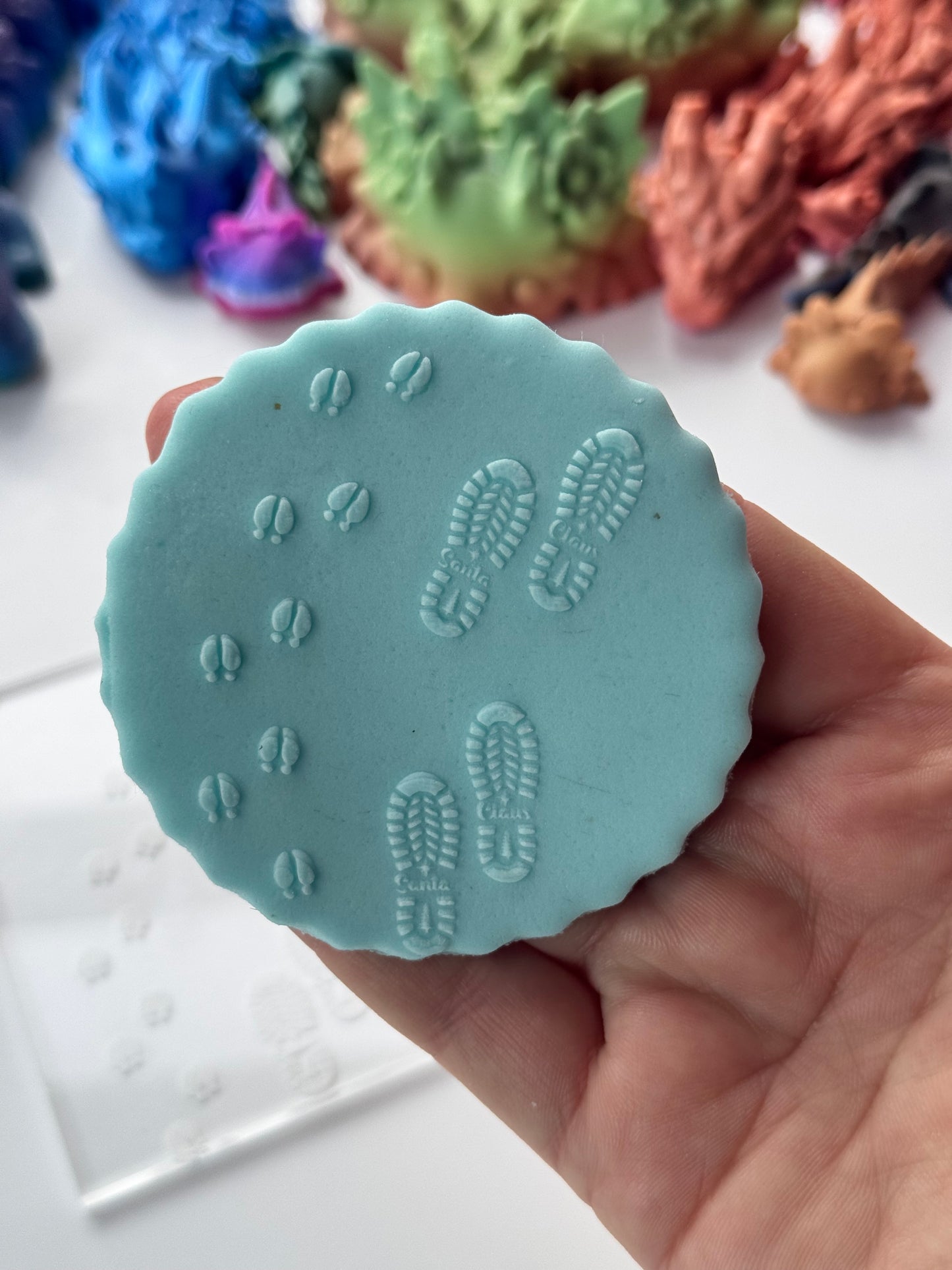 footprint Christmas Santa Claus and reindeer deboss
