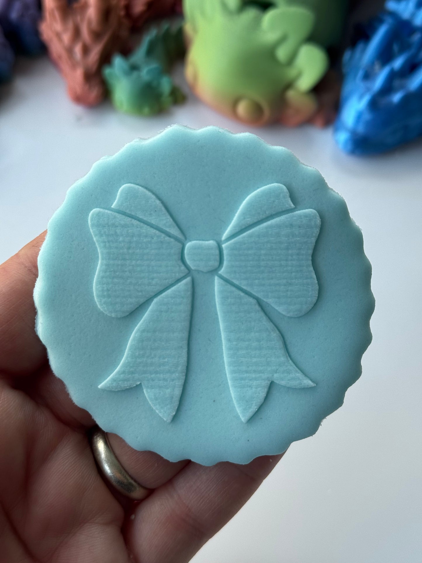 bow deboss disc
