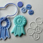 Rosette award deboss and matching cutter + mini stamp deboss
